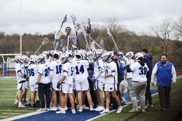 Westhill High Lacrosse – Hazing Case, 2025download High school lacrosse team celebrating on field before hazing incident
